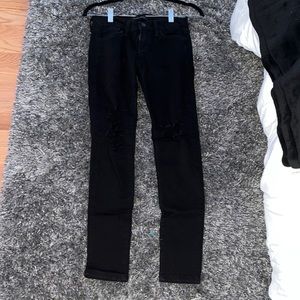 Flying Monkey, Black skinny with stretch distressed . Rips on the knees